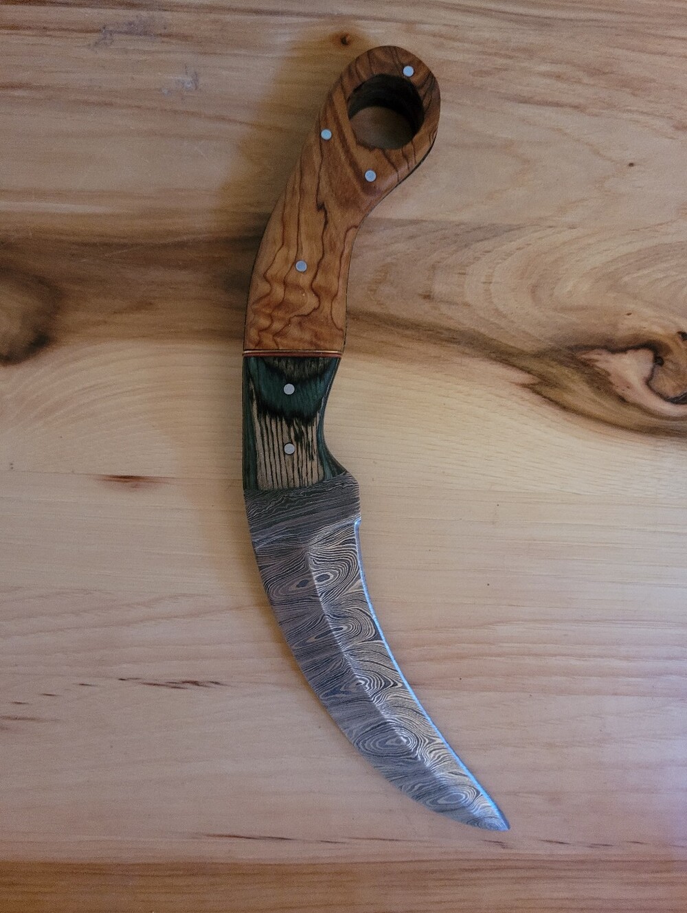 Damascus Karambit Knife With Olive Wood Handle.